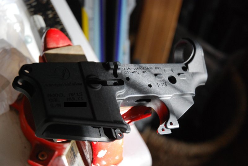 AR-15 stripped lower receiver || NIKON D80/18-70mm f/3.5-4.5@46 | 1/20s | f4.5 | ISO560 || 2010-03-20 16:04:04