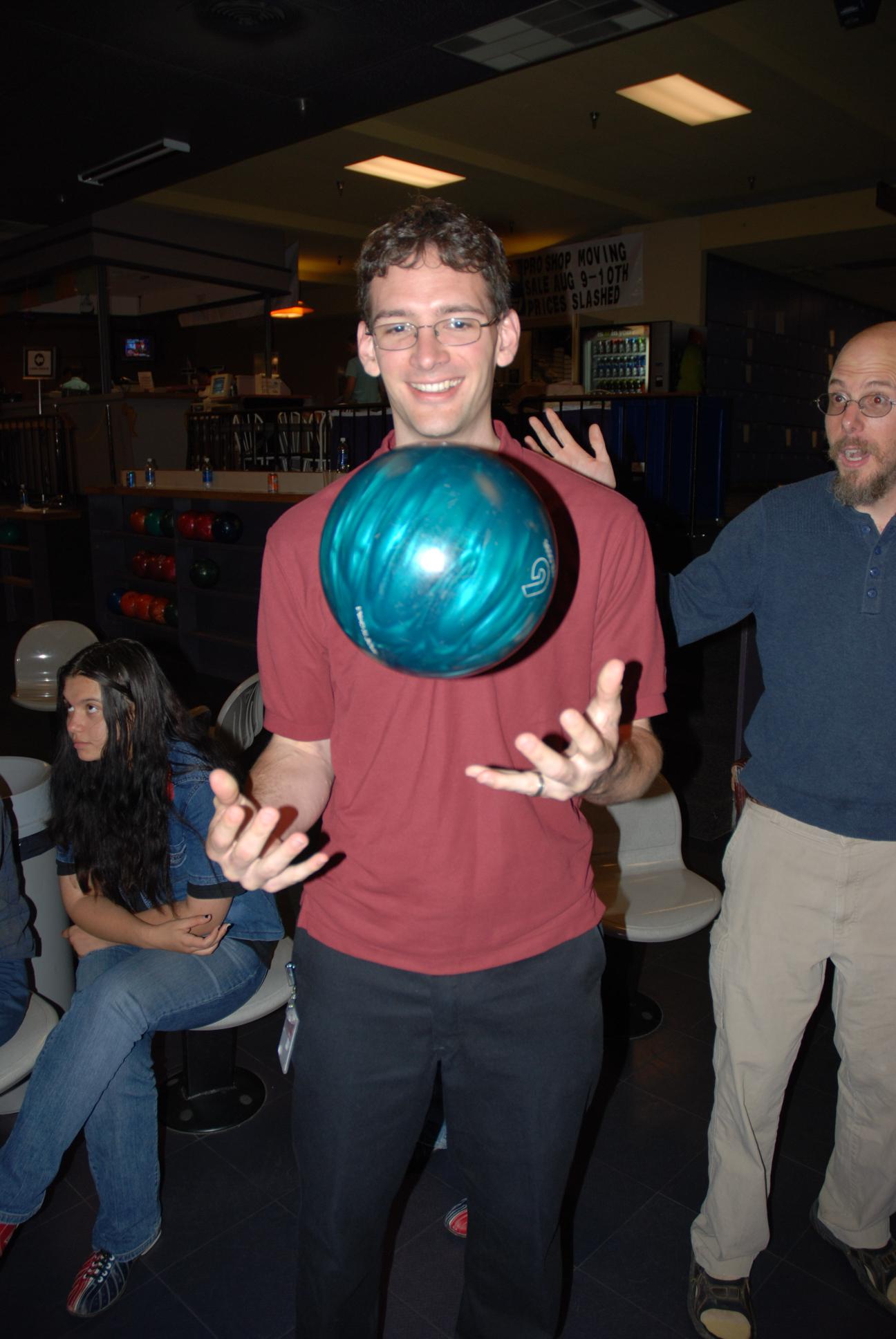 Dieter Tossing a Bowling Ball || NIKON D80/18-70mm f/3.5-4.5@18 | 1/60s | f3.5 | ISO100 || 2007-08-03 15:14:49